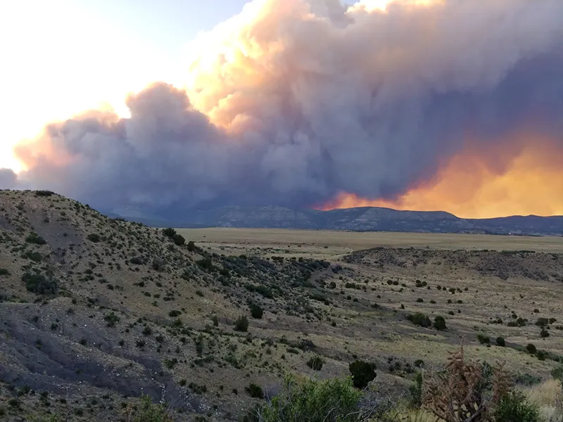 Plume smoke rising in the distance